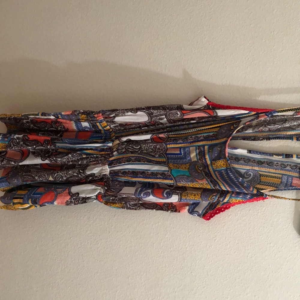 Vibrant patterned, shorts romper. tank top.